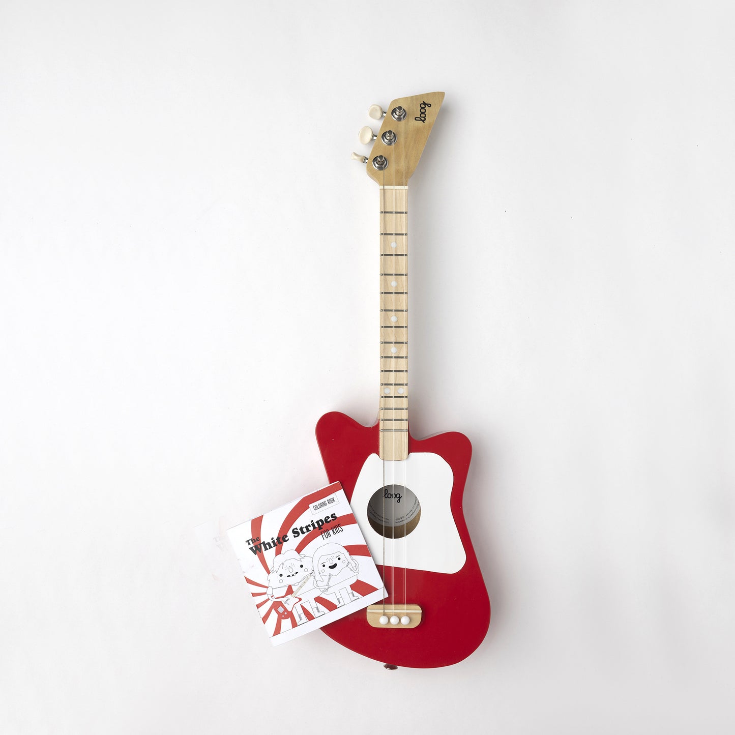 This limited edition of our beloved Loog Mini sports the White Stripes' peppermint logo in the back of the guitar body, comes with a "White Stripes for Kids" coloring book, chord flashcards and app access. We even include a red crayon! 🖍️