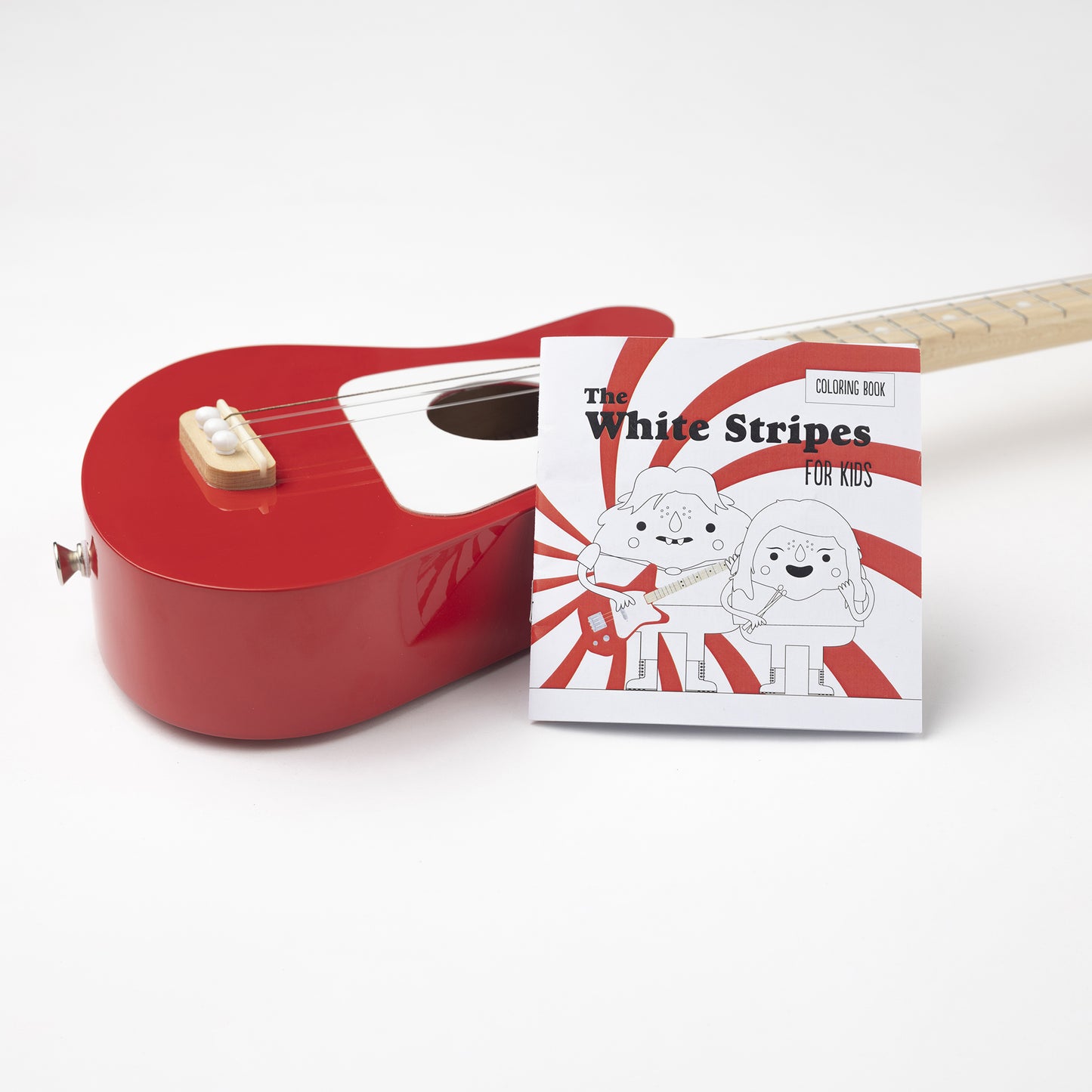 This limited edition of our beloved Loog Mini sports the White Stripes' peppermint logo in the back of the guitar body, comes with a "White Stripes for Kids" coloring book, chord flashcards and app access. We even include a red crayon! 🖍️